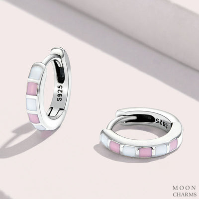 Light Pink and white hoop earrings Buckles