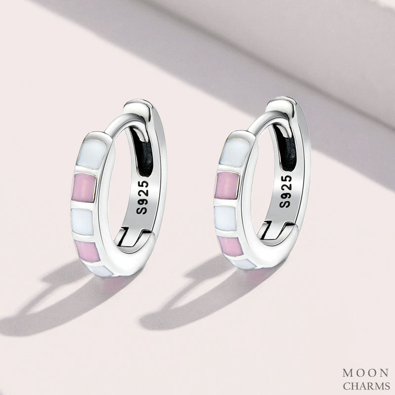 Light Pink and white hoop earrings Buckles